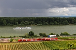 Wetterkapriolen wie im April boten sich bei der Vorbeifahrt eines 425 als RB 38752 (Mannheim-Friedrichsfeld - Mainz) nahe Nackenheim. (23.06.2015) <i>Foto: Joachim Bügel</i>